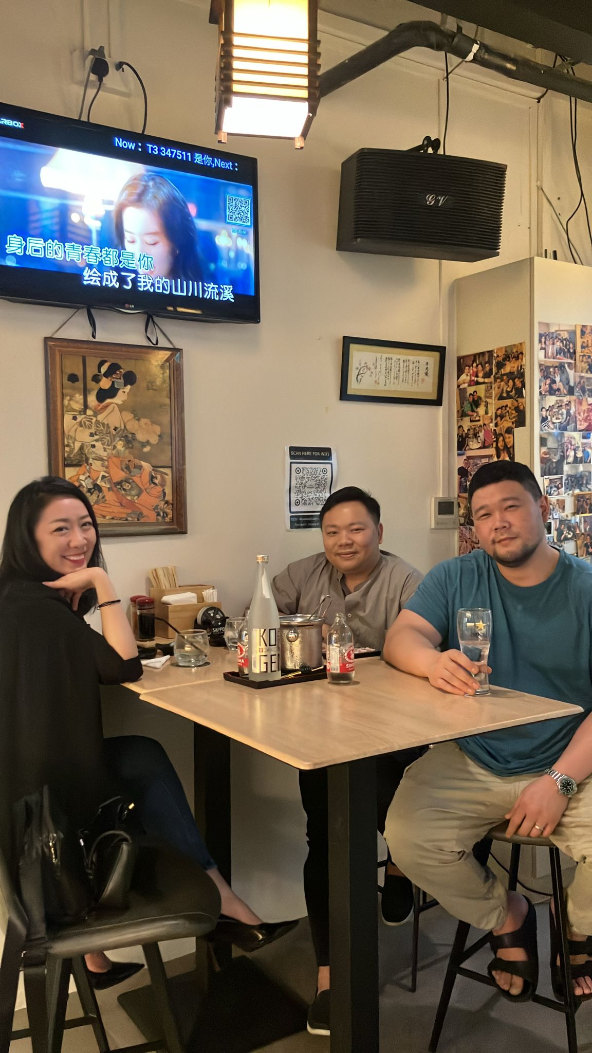 Happy customers enjoying dinner at Izakaya Tamako
